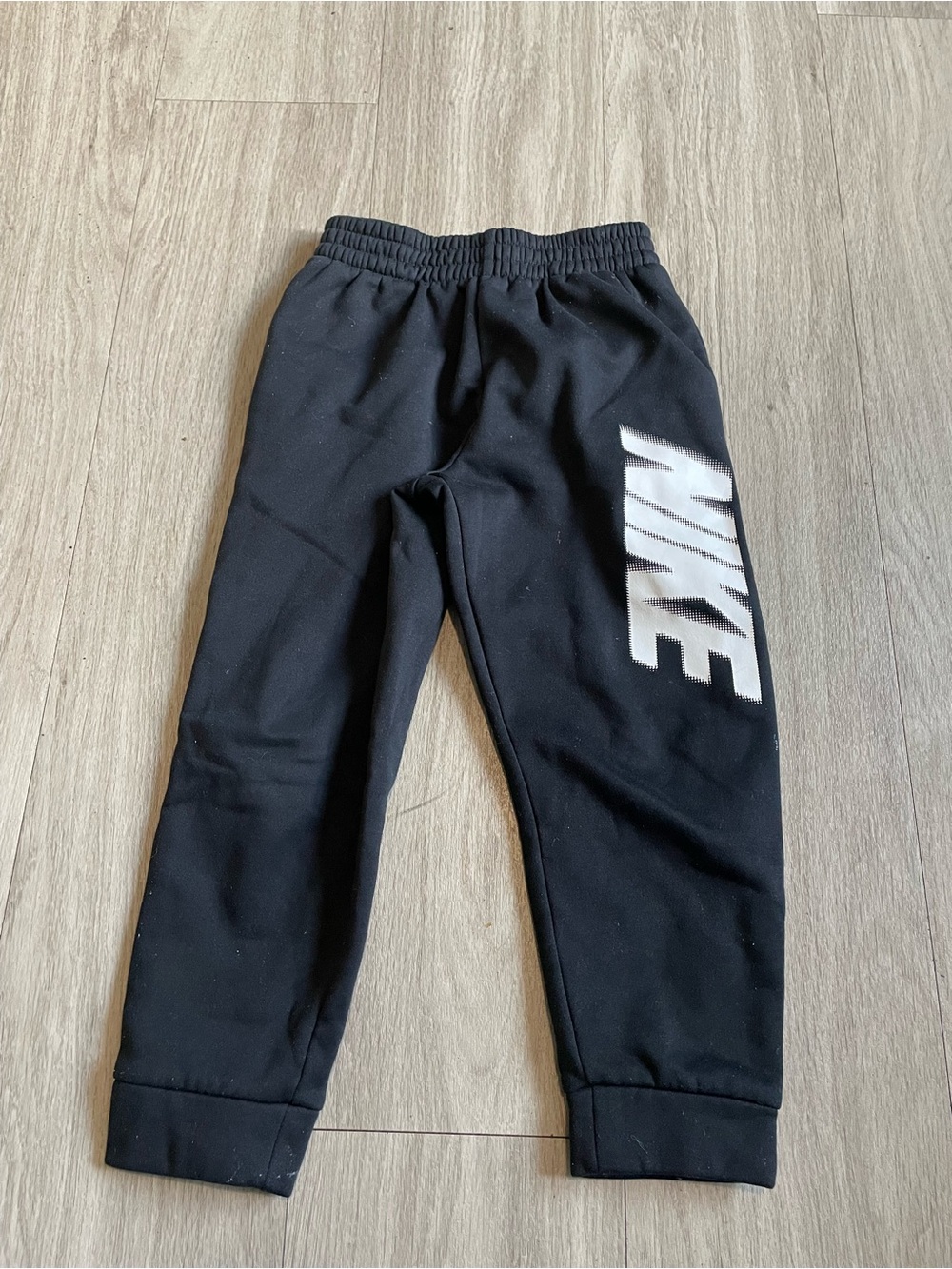 Nike Kids Black Sweatpants with White Side Logo